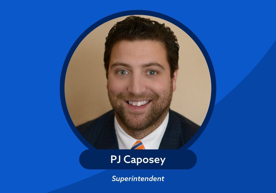 Photo of PJ Caposey Superintendent on top of blue background