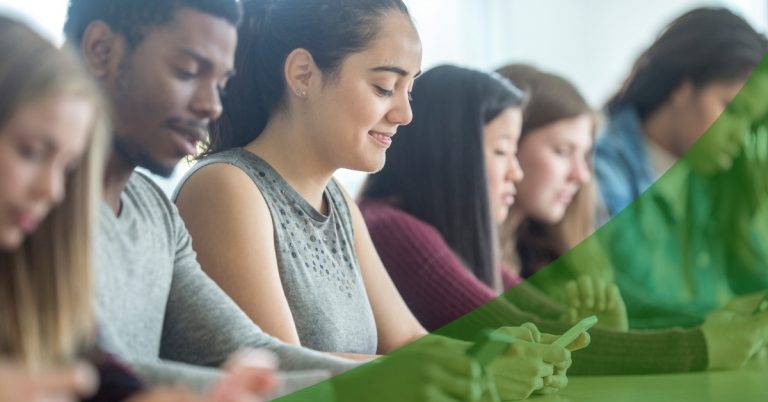 group of students working at a table together