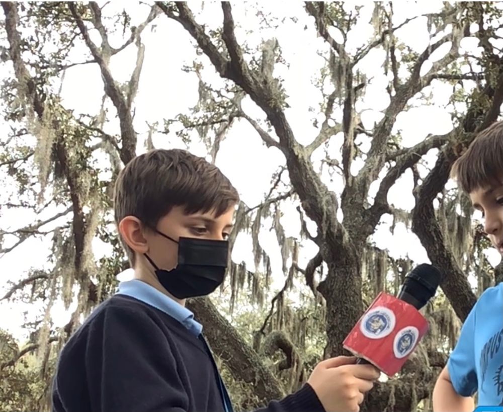 Liam, student at Corpus Christi Catholic School, interviews a peer for "Cougar Conversations."